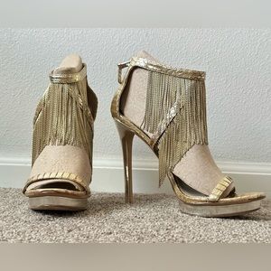 Brian Atwood open toe high heels. Size 9. Shinny gold color leather ish material